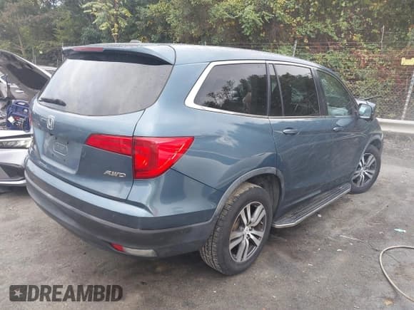 ✅ 2016 Honda Pilot EX-L • VIN: 5FNYF6H84GB085595 • Lot: 43265523. Listed on IAAI with 139,023 mi. Free auction sales archive from the USA and detailed vehicle history report at DreamBid. Image 4.