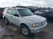 ✅ 2001 Isuzu Rodeo S • VIN: 4S2DM58WX14352481 • Lot: 42152621. Listed on IAAI with 162,696 mi. Free auction sales archive from the USA and detailed vehicle history report at DreamBid. Image 1.