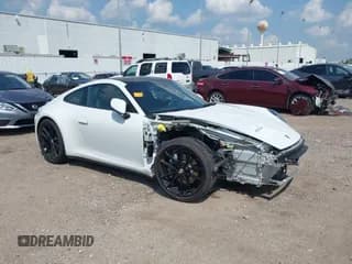 ✅ 2022 Porsche 911 Carrera • VIN: WP0AA2A91NS206000 • Lot: 40382242. Listed on IAAI with 26,394 mi. Free auction sales archive from the USA and detailed vehicle history report at DreamBid. Image 1.
