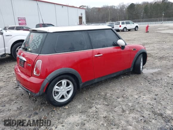 ✅ 2006 MINI Hardtop • VIN: WMWRC33566TK71463 • Lot: 43707414. Listed on IAAI with 143,865 mi. Free auction sales archive from the USA and detailed vehicle history report at DreamBid. Image 4.