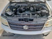 ✅ 2009 Suzuki Equator • VIN: 5Z6BD06TX9C412101 • Lot: 70028155. Wystawiony na Copart z przebiegiem 108 904 mil. Bezpłatny archiwum sprzedaży aukcyjnych z USA i szczegółowy raport historii pojazdu na DreamBid. Zdjęcie 11.