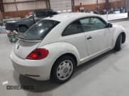 ✅ 2015 Volkswagen Beetle Fleet Edition • VIN: 3VWF17AT0FM601159 • Lot: 42127817. Listed on IAAI with 129,117 mi. Free auction sales archive from the USA and detailed vehicle history report at DreamBid. Image 4.