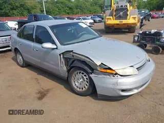 ✅ 2000 Saturn LS • VIN: 1G8JW52R9YY654613 • Lot: 42411366. Listed on IAAI with 104,134 mi. Free auction sales archive from the USA and detailed vehicle history report at DreamBid. Image 1.