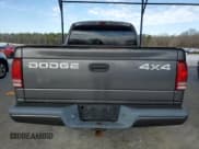 ✅ 2002 Dodge Dakota Sport • VIN: 1B7HG38N12S515919 • Lot: 42930835. Wystawiony na Copart z przebiegiem 180 701 mil. Bezpłatny archiwum sprzedaży aukcyjnych z USA i szczegółowy raport historii pojazdu na DreamBid. Zdjęcie 6.