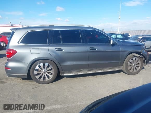 ✅ 2018 Mercedes-Benz GL 450 • VIN: 4JGDF6EE1JA999114 • Lot: 43748546. Listed on IAAI with 118,589 mi. Free auction sales archive from the USA and detailed vehicle history report at DreamBid. Image 13.