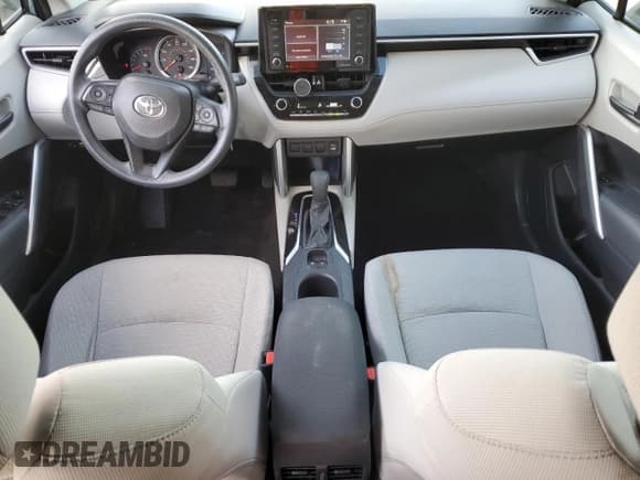 ✅ 2022 Toyota Corolla Cross L • VIN: 7MUAAABG9NV034823 • Lot: 89881115. Listed on Copart with 21,466 mi. Free auction sales archive from the USA and detailed vehicle history report at DreamBid. Image 8.