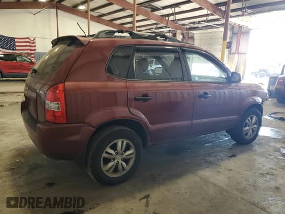 2009 Hyundai Tucson GLS z VIN KM8JM12BX9U972834, wystawiony jako Copart lot #78595274 z przebiegiem 94 166 mil mil oraz Szkoda całkowita • Salvage title. Historia ofert i sprzedaży dostępna na DreamBid. Obrazek 3.