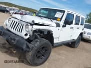 ✅ 2015 Jeep Wrangler Unlimited Rubicon • VIN: 1C4BJWFG2FL752500 • Lot: 43524542. Wystawiony na IAAI z przebiegiem 118 418 mil. Bezpłatny archiwum sprzedaży aukcyjnych z USA i szczegółowy raport historii pojazdu na DreamBid. Zdjęcie 18.