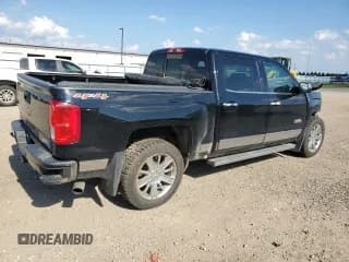 ✅ 2017 Chevrolet Silverado 1500 High Country • VIN: 3GCUKTEJ5HG218764 • Лот: 68586224. Опубликован ранее на Copart с пробегом 98 252 миль. Бесплатный доступ к архиву аукционных продаж из США и подробный отчёт об истории автомобиля на DreamBid. Изображение 3.