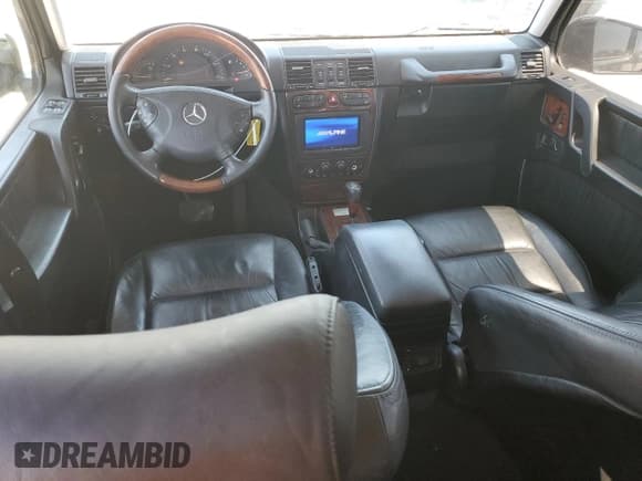 ✅ 2005 Mercedes-Benz G 500 • VIN: WDCYR49E65X163405 • Lot: 61820895. Listed on Copart with 163,666 mi. Free auction sales archive from the USA and detailed vehicle history report at DreamBid. Image 8.
