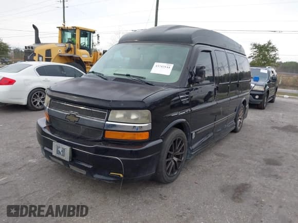✅ 2014 Chevrolet Express Cargo Upfitter • VIN: 1GBSGDC42E1123458 • Lot: 43742144. Listed on IAAI with 165,786 mi. Free auction sales archive from the USA and detailed vehicle history report at DreamBid. Image 2.