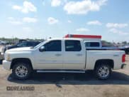 ✅ 2013 Chevrolet Silverado 1500 LTZ • VIN: 3GCPKTE75DG315975 • Lot: 43125191. Wystawiony na IAAI z przebiegiem 211 900 mil. Bezpłatny archiwum sprzedaży aukcyjnych z USA i szczegółowy raport historii pojazdu na DreamBid. Zdjęcie 14.