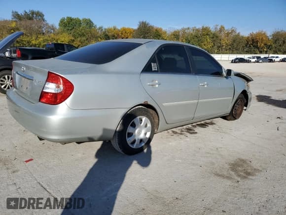 ✅ 2003 Toyota Camry XLE • VIN: 4T1BE30K83U718904 • Lot: 90705005. Listed on Copart with Not provided. Free auction sales archive from the USA and detailed vehicle history report at DreamBid. Image 3.