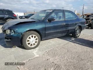 ✅ 1997 Geo Prizm LSi • VIN: 1Y1SK5283VZ442062 • Lot: 80171294. Listed on Copart with 340,180 mi. Free auction sales archive from the USA and detailed vehicle history report at DreamBid. Image 1.