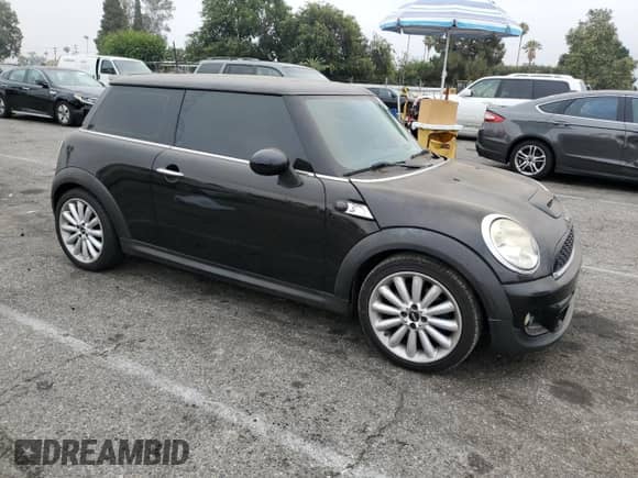 2012 MINI Hardtop S with VIN WMWSV3C52CTY17540, listed as a Copart auction lot 64137185 with 115,542 mi miles and Salvage title. Bid and sale history available at DreamBid. Image 4.