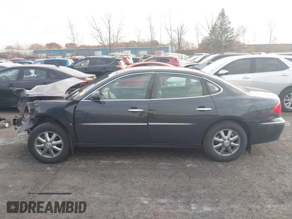 ✅ 2009 Buick LaCrosse CXL • VIN: 2G4WD582691209452 • Лот: 43712782. Опубликован ранее на IAAI с пробегом 58 670 миль. Бесплатный доступ к архиву аукционных продаж из США и подробный отчёт об истории автомобиля на DreamBid. Изображение 15.
