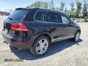 ✅ 2013 Volkswagen Touareg Lux • VIN: WVGEF9BP0DD001565 • Lot: 63070845. Listed on Copart with 123,788 mi. Free auction sales archive from the USA and detailed vehicle history report at DreamBid. Image 3.