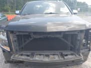 ✅ 2015 Chevrolet Tahoe LTZ • VIN: 1GNSCCKC8FR121461 • Lot: 42407901. Listed on IAAI with 137,729 mi. Free auction sales archive from the USA and detailed vehicle history report at DreamBid. Image 13.