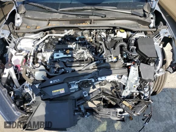 ✅ 2023 Toyota Corolla Cross Hybrid S • VIN: 7MUFBABG5PV017023 • Lot: 90942025. Listed on Copart with 18,740 mi. Free auction sales archive from the USA and detailed vehicle history report at DreamBid. Image 12.