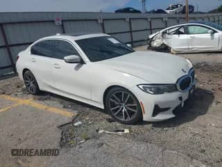 2020 BMW 3 Series 330i z VIN 3MW5R1J09L8B29779, wystawiony jako IAAI lot #43077338 z przebiegiem 73 062 mil mil oraz . Historia ofert i sprzedaży dostępna na DreamBid. Obrazek 1.