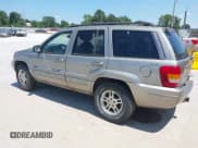 ✅ 1999 Jeep Grand Cherokee Limited • VIN: 1J4GW68S2XC675499 • Лот: 42887084. Опубликован ранее на IAAI с пробегом 167 420 миль. Бесплатный доступ к архиву аукционных продаж из США и подробный отчёт об истории автомобиля на DreamBid. Изображение 3.
