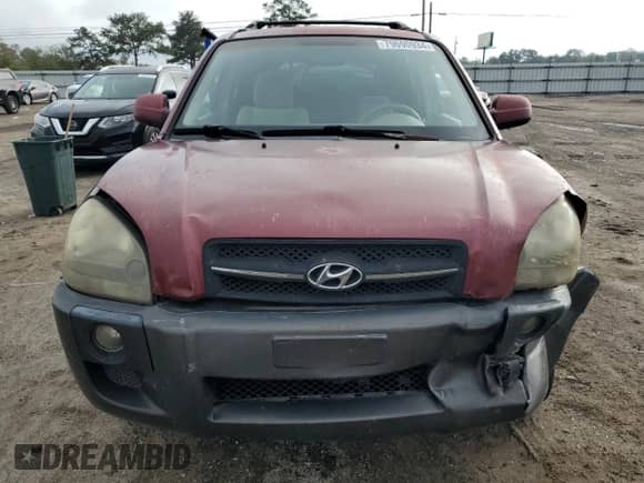2005 Hyundai Tucson GLS z VIN KM8JN12D05U129525, wystawiony jako Copart lot #79690934 z przebiegiem 169 061 mil mil oraz Szkoda całkowita • Salvage title. Historia ofert i sprzedaży dostępna na DreamBid. Obrazek 5.