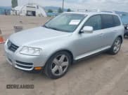 ✅ 2004 Volkswagen Touareg • VIN: WVGCM77L74D056246 • Lot: 43056678. Listed on IAAI with 153,345 mi. Free auction sales archive from the USA and detailed vehicle history report at DreamBid. Image 2.