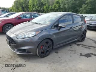 ✅ 2016 Ford Fiesta ST • VIN: 3FADP4GX9GM118911 • Lot: 70305305. Wystawiony na Copart z przebiegiem 74 374 mil. Bezpłatny archiwum sprzedaży aukcyjnych z USA i szczegółowy raport historii pojazdu na DreamBid. Zdjęcie 1.