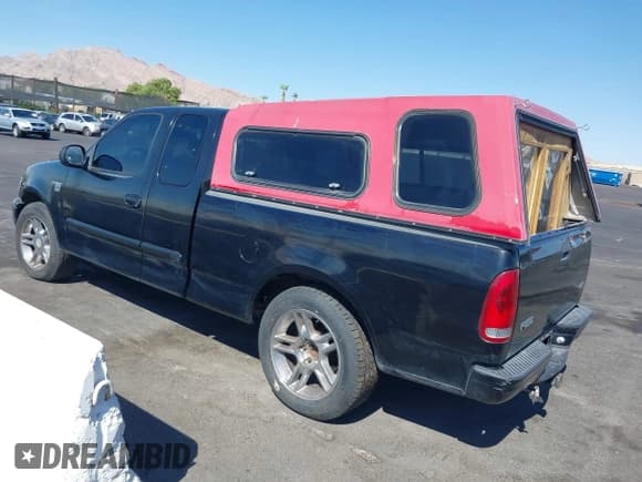 ✅ 2001 Ford F-150 XL • VIN: 1FTRX17W21NA13954 • Lot: 42945842. Listed on IAAI with Not provided. Free auction sales archive from the USA and detailed vehicle history report at DreamBid. Image 3.
