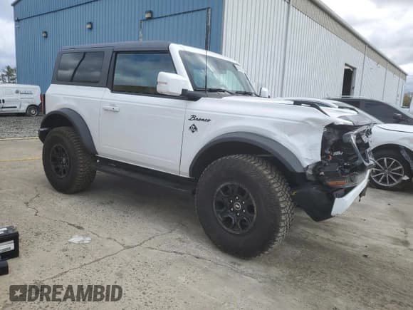 ✅ 2023 Ford Bronco • VIN: 1FMDE5CH1PLB18922 • Lot: 53439935. Listed on Copart with 33,288 mi. Free auction sales archive from the USA and detailed vehicle history report at DreamBid. Image 4.