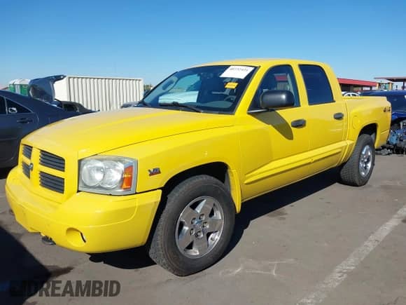 2006 Dodge Dakota SLT z VIN 1D7HW48J46S584508, wystawiony jako IAAI lot #40732421 z przebiegiem 148 957 mil mil oraz . Historia ofert i sprzedaży dostępna na DreamBid. Obrazek 17.