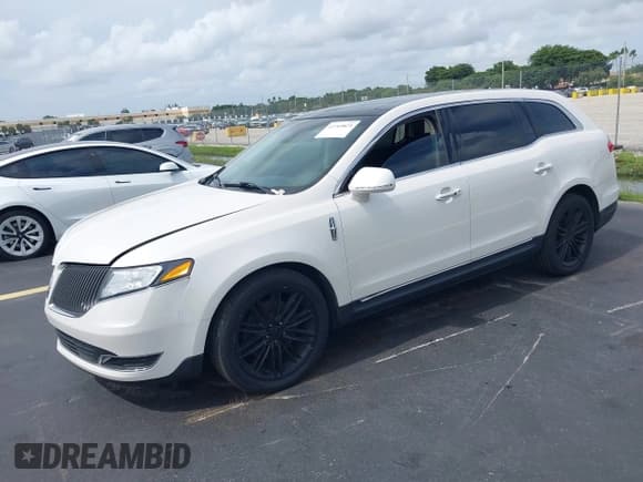✅ 2015 Lincoln MKT EcoBoost • VIN: 2LMHJ5AT0FBL01414 • Lot: 42769825. Listed on IAAI with 126,223 mi. Free auction sales archive from the USA and detailed vehicle history report at DreamBid. Image 2.