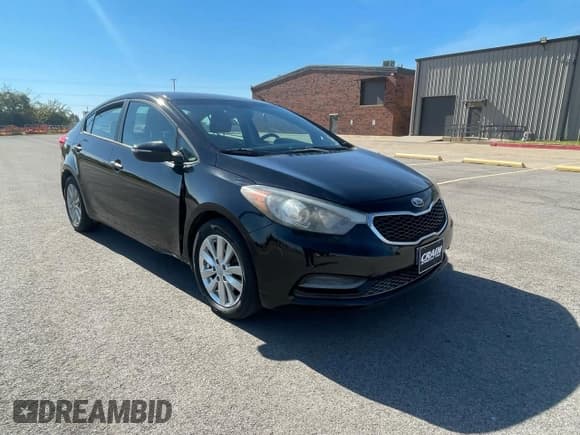 ✅ 2014 Kia Forte LX • VIN: KNAFX4A62E5249083 • Lot: 92046415. Listed on Copart with 98,097 mi. Free auction sales archive from the USA and detailed vehicle history report at DreamBid. Image 1.