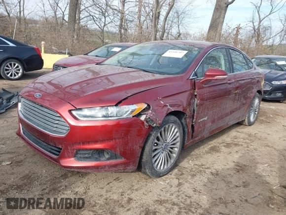 ✅ 2014 Ford Fusion Titanium Hybrid • VIN: 3FA6P0RU9ER175288 • Lot: 41101707. Listed on IAAI with 158,553 mi. Free auction sales archive from the USA and detailed vehicle history report at DreamBid. Image 2.