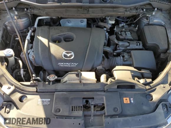 ✅ 2016 Mazda CX-5 Sport • VIN: JM3KE4BY5G0799523 • Lot: 84644205. Listed on Copart with 149,112 mi. Free auction sales archive from the USA and detailed vehicle history report at DreamBid. Image 12.