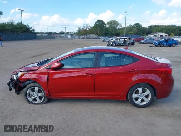 ✅ 2013 Hyundai Elantra GLS • VIN: KMHDH4AE9DU631867 • Lot: 43363264. Listed on IAAI with 64,875 mi. Free auction sales archive from the USA and detailed vehicle history report at DreamBid. Image 14.