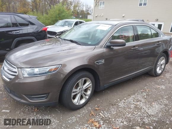 ✅ 2016 Ford Taurus SEL • VIN: 1FAHP2E81GG138775 • Лот: 43606670. Опубликован ранее на IAAI с пробегом 194 209 миль. Бесплатный доступ к архиву аукционных продаж из США и подробный отчёт об истории автомобиля на DreamBid. Изображение 2.