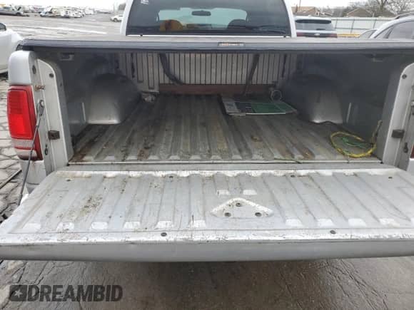 2002 Dodge Dakota SLT z VIN 1B7HL48X72S584617, wystawiony jako Copart lot #86504284 z przebiegiem 236 216 mil mil oraz Szkoda całkowita • Salvage title. Historia ofert i sprzedaży dostępna na DreamBid. Obrazek 12.