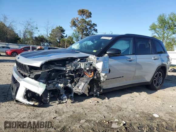 2022 Jeep Grand Cherokee Trailhawk with VIN 1C4RJYC62N8715910, listed as a Copart auction lot 52332265 with 21,976 mi miles and Salvage title. Bid and sale history available at DreamBid. Image 1.