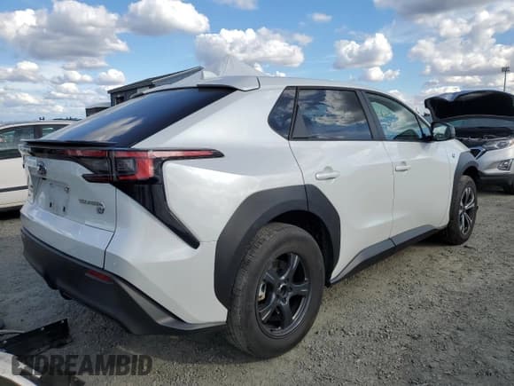 ✅ 2023 Subaru Solterra Premium • VIN: JTMABABA0PA023910 • Лот: 72095665. Опубликован ранее на Copart с пробегом 48 818 миль. Бесплатный доступ к архиву аукционных продаж из США и подробный отчёт об истории автомобиля на DreamBid. Изображение 3.