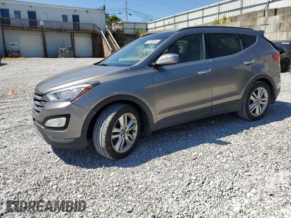 ✅ 2015 Hyundai Santa Fe • VIN: 5XYZW4LAXFG239754 • Lot: 71499665. Listed on Copart with 75,339 mi. Free auction sales archive from the USA and detailed vehicle history report at DreamBid. Image 1.