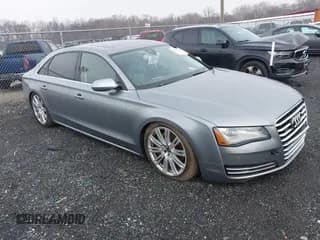✅ 2013 Audi A8 3.0L • VIN: WAURGAFD0DN005546 • Lot: 43806422. Listed on IAAI with 140,730 mi. Free auction sales archive from the USA and detailed vehicle history report at DreamBid. Image 1.
