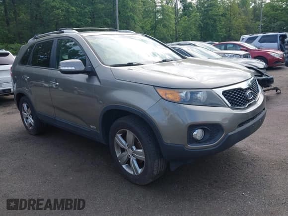 ✅ 2013 Kia Sorento EX • VIN: 5XYKUDA65DG413913 • Lot: 42256920. Listed on IAAI with 115,829 mi. Free auction sales archive from the USA and detailed vehicle history report at DreamBid. Image 1.