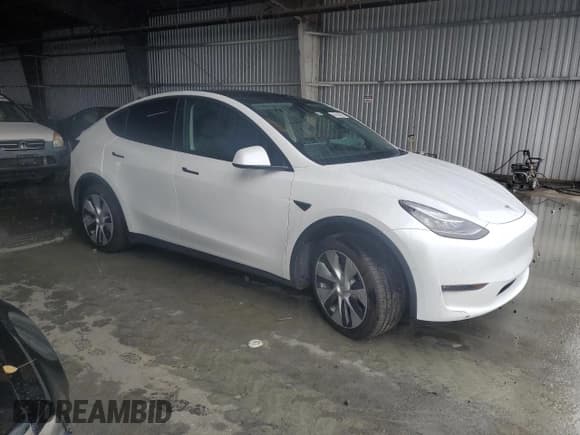 ✅ 2022 Tesla Model Y Long Range • VIN: 7SAYGDEE4NA015233 • Lot: 86553295. Listed on Copart with 38,106 mi. Free auction sales archive from the USA and detailed vehicle history report at DreamBid. Image 4.