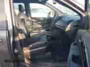 2018 Dodge Grand Caravan SXT z VIN 2C4RDGCG8JR159899, wystawiony jako IAAI lot #42837233 z przebiegiem 104 074 mil mil oraz . Historia ofert i sprzedaży dostępna na DreamBid. Obrazek 5.