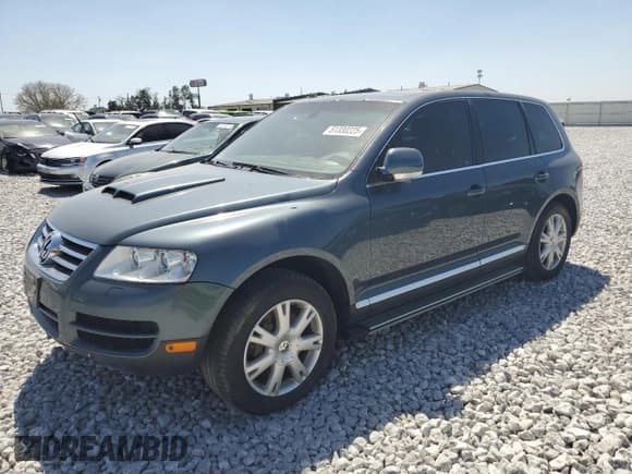 ✅ 2006 Volkswagen Touareg • VIN: WVGPT77LX6D056538 • Lot: 51330225. Listed on Copart with 183,060 mi. Free auction sales archive from the USA and detailed vehicle history report at DreamBid. Image 1.