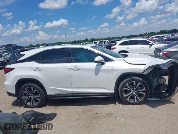 ✅ 2020 Lexus RX 350 • VIN: 2T2HZMAA0LC179184 • Lot: 42618445. Listed on IAAI with 69,493 mi. Free auction sales archive from the USA and detailed vehicle history report at DreamBid. Image 13.
