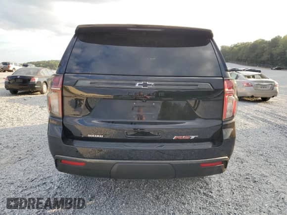 2021 Chevrolet Tahoe RST with VIN 1GNSKRKT3MR463029, listed as a Copart auction lot 73021574 with 35,032 mi miles and Salvage title. Bid and sale history available at DreamBid. Image 6.