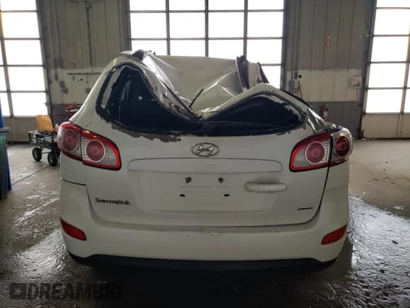 ✅ 2012 Hyundai Santa Fe GLS • VIN: 5XYZGDAB7CG165102 • Lot: 50935914. Wystawiony na Copart z przebiegiem 182 523 mil. Bezpłatny archiwum sprzedaży aukcyjnych z USA i szczegółowy raport historii pojazdu na DreamBid. Zdjęcie 6.