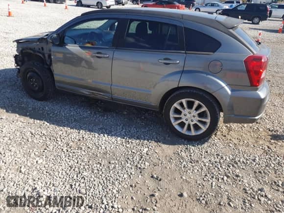2012 Dodge Caliber SXT Plus with VIN 1C3CDWEA1CD532719, listed as a Copart auction lot 71418365 with 147,306 mi miles and Salvage title. Bid and sale history available at DreamBid. Image 2.